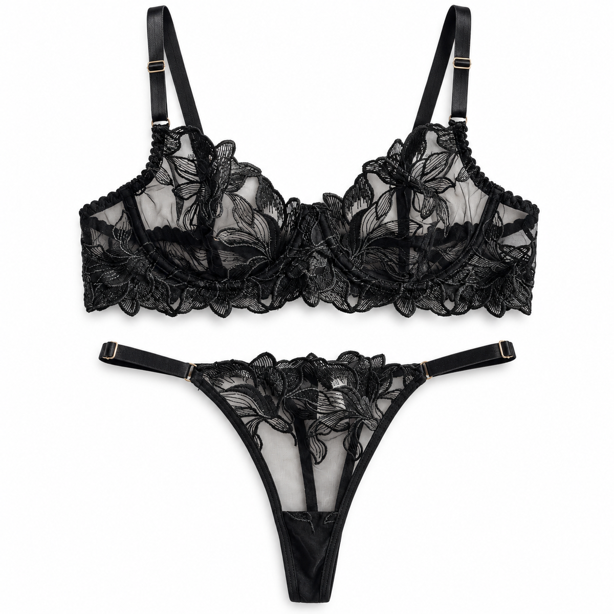Black floral lace lingerie set featuring a sheer underwire bra and a matching thong with adjustable straps and gold-tone hardware, displayed on a clean white background.