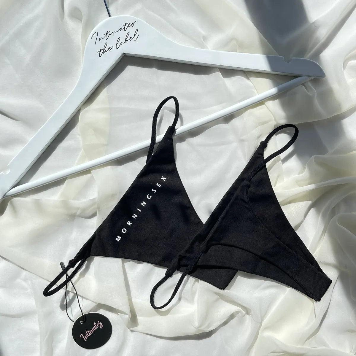 Black cotton G-string thong underwear from Undone, designed for comfort and minimal coverage.