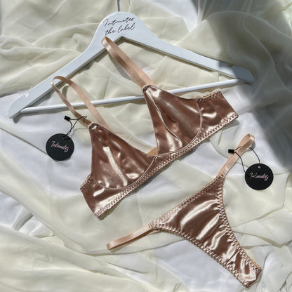 Undone Eternity Satin Bralette and matching underwear set in soft satin, featuring delicate straps and elegant design.