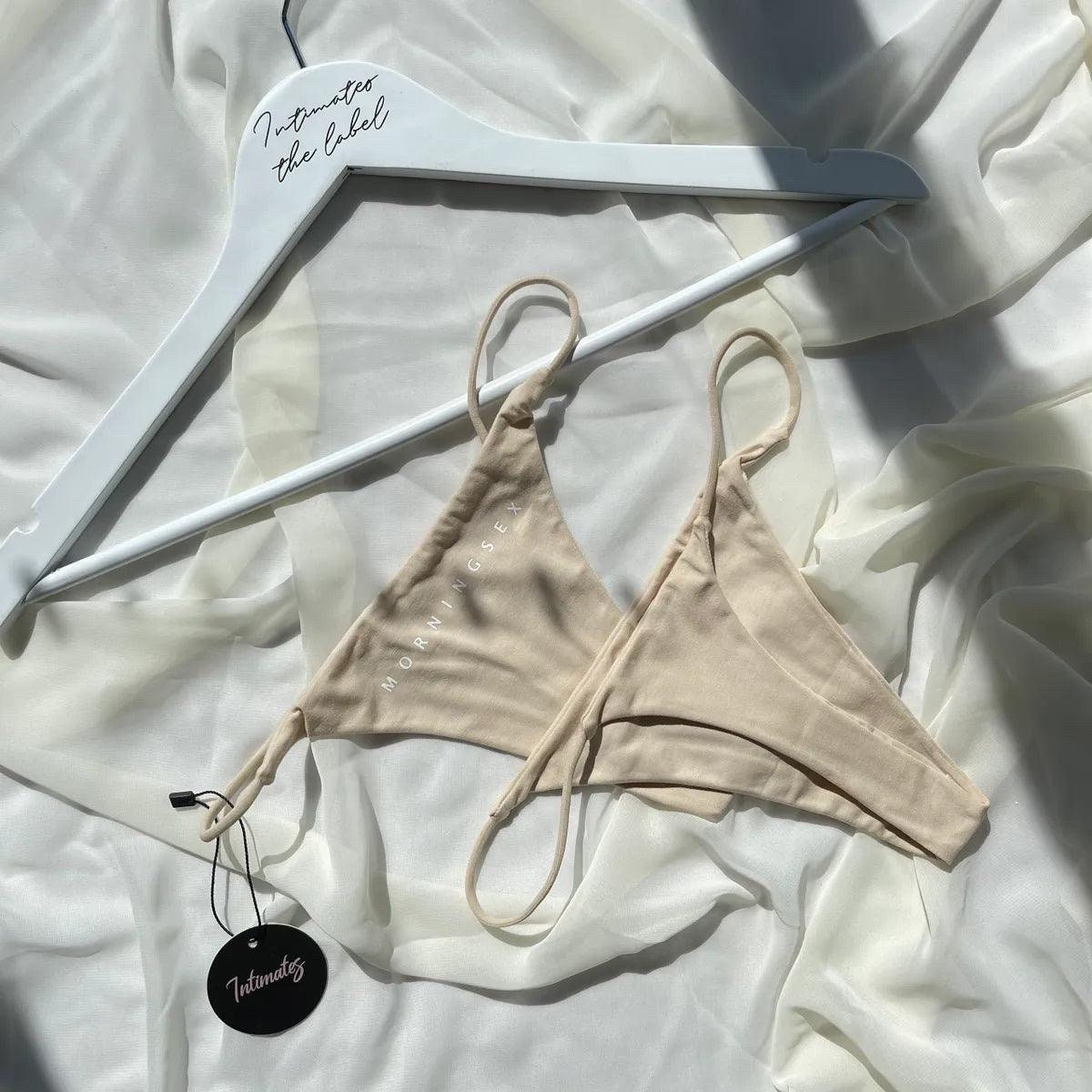 Undone nude cotton G-string thong labeled Morning Sex, featuring minimal coverage and slim waistband for a comfortable fit.
