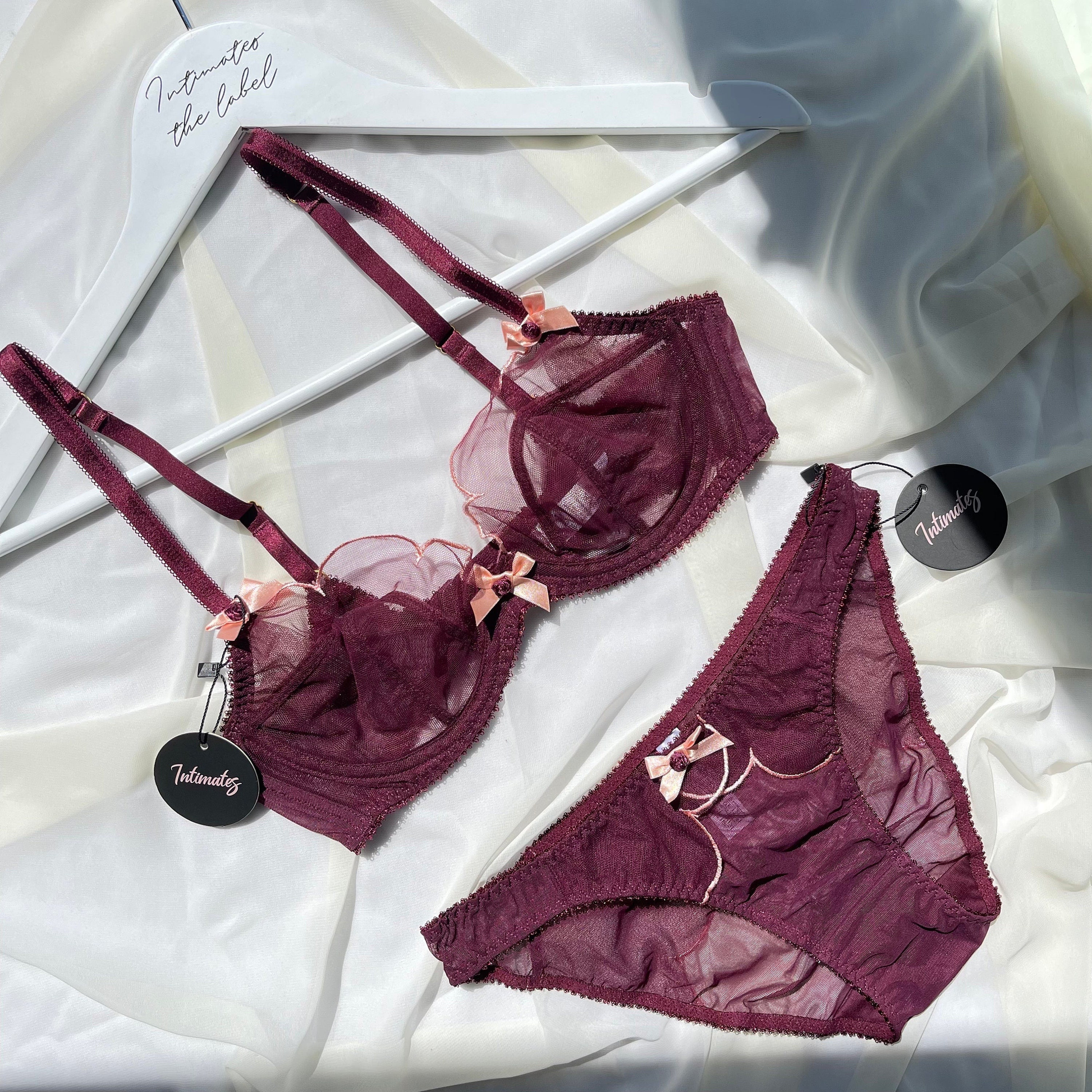 Undone luxury minimal sheer black lingerie set featuring delicate lace details and a sleek, elegant design.