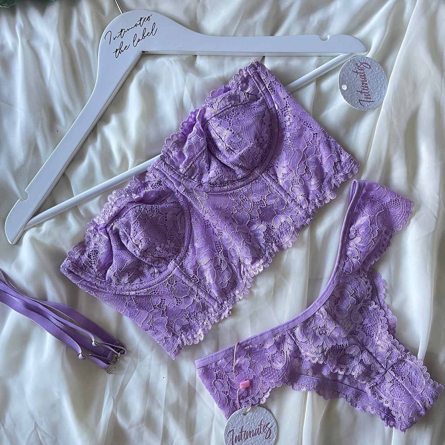 Undone Sweet Bodylace lingerie set featuring delicate lace details and matching bra and panty in soft pastel colors.
