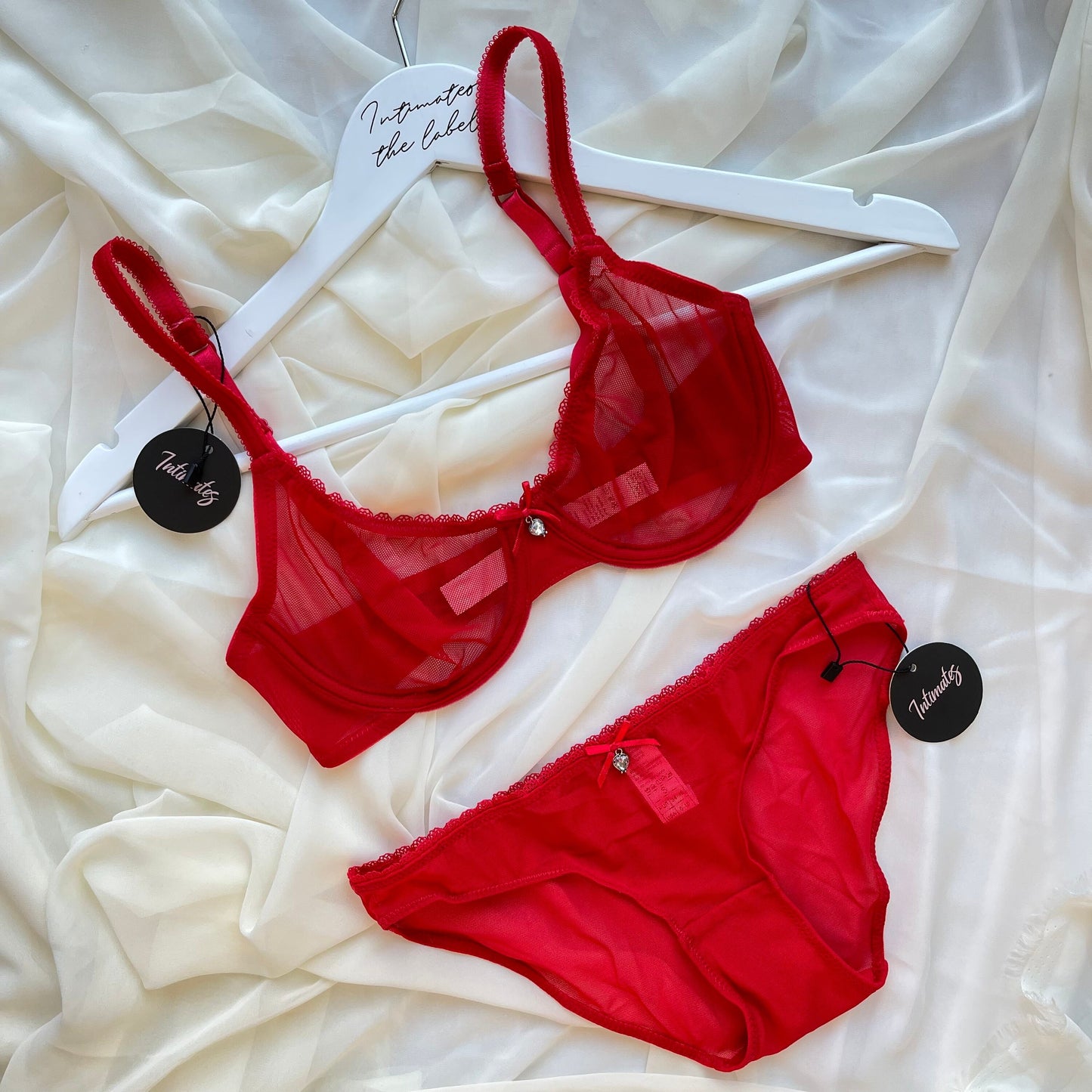 Undone Classic L’amour red lingerie set featuring sheer full briefs and matching bra, elegant and sensual lingerie for women.